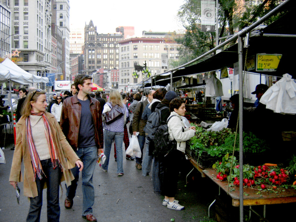 People shopping at a market in New York Coty