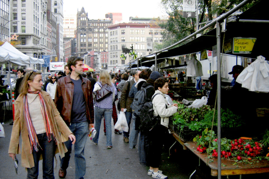 People shopping at a market in New York Coty